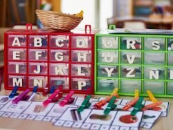 Letters and pictures beginning with the letters in a Montessori Classroom