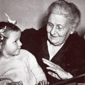 Maria Montessori with a child