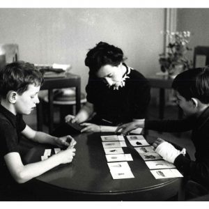 Maria Montessori working with a child